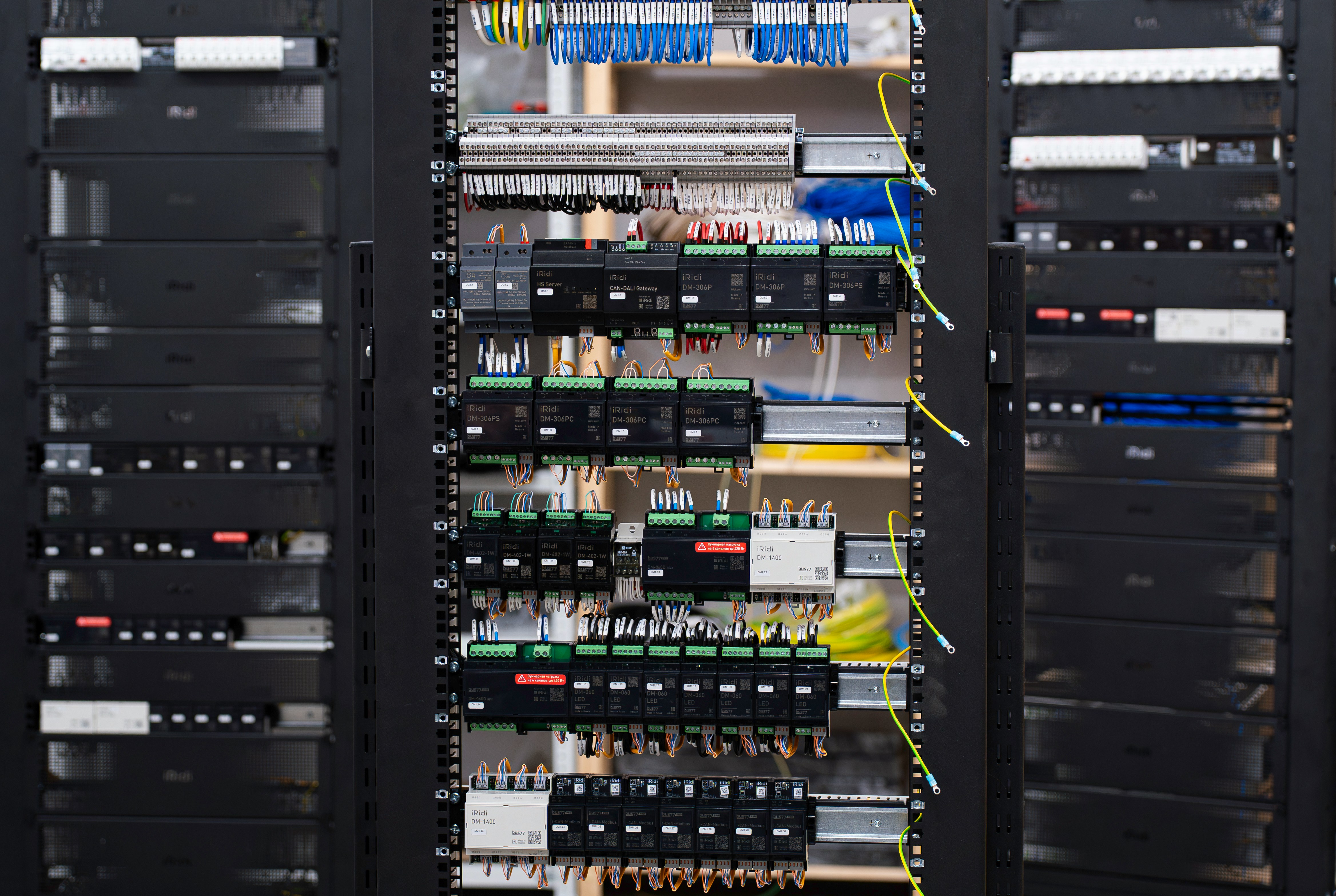 open electrical control panel with wires and circuit breakers